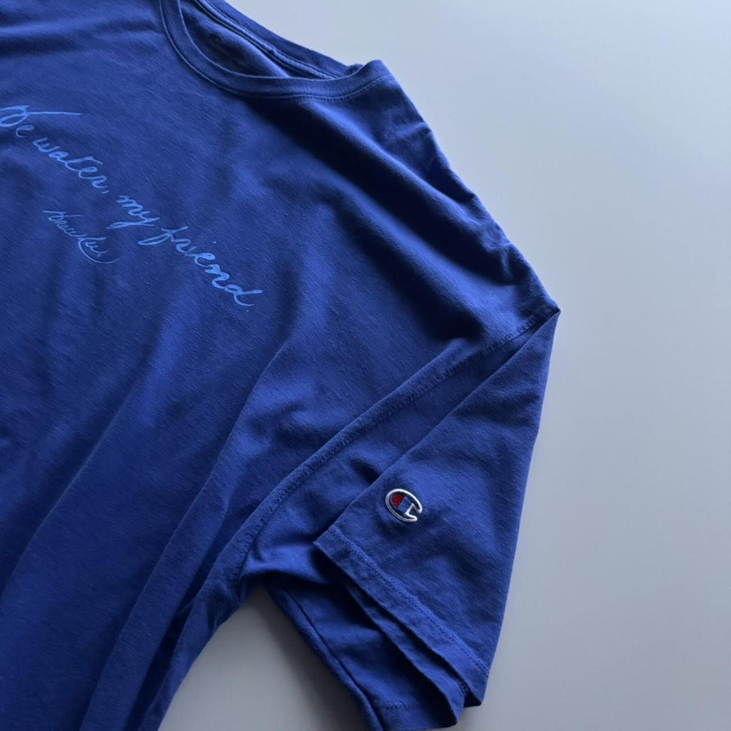 Champion “Be Water, My Friend” T-Shirt