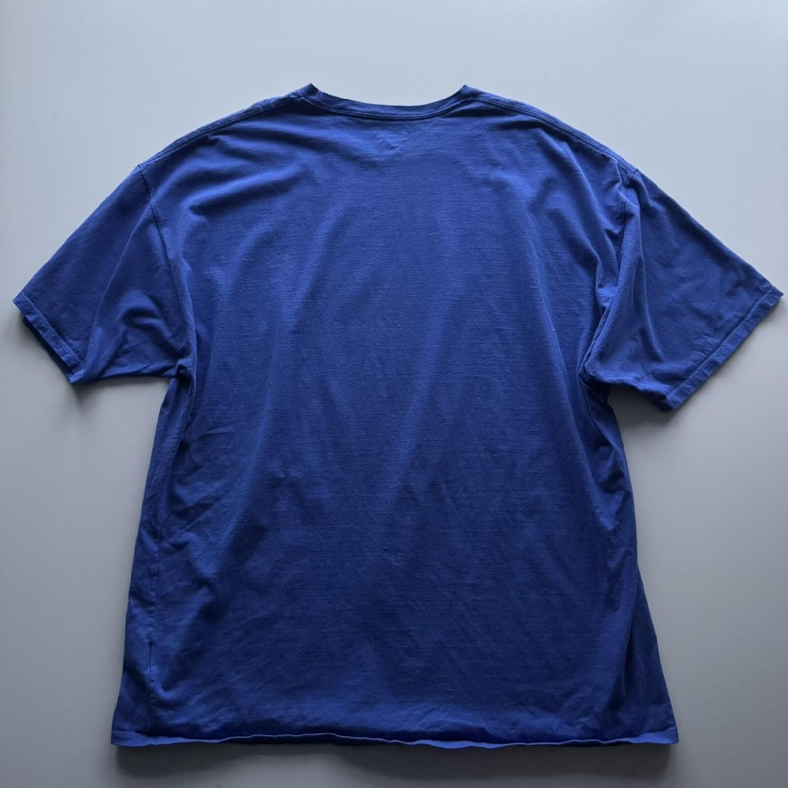 Champion “Be Water, My Friend” T-Shirt